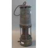 Thomas & Williams, Aberdare original brass miners safety lamp. 26cm high approx. (B.P. 21% + VAT)