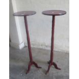 A pair of stained mahogany tripod torchere stands (2) (B.P. 21% + VAT)