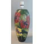 Moorcroft Art Pottery tube lined green ground 'Hibiscus' table Lamp base of ovoid form - 37cm high