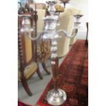 Chrome finish floor 5 section candelabra on wooden pedestal and chrome base. (B.P. 21% + VAT)