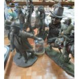 Two trays of bronzed figurines, Indians on horse back, cowboy, Laurel & Hardy and John Wayne, hand
