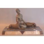 Art Deco spelter portrait group of a woman with two Greyhounds on a coloured marble rectangular