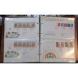 Great Britain collection of stamp first day covers in album and small box. 1978 to 2000s. (B.P.