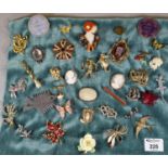 Box file of vintage costume brooches, varying designs to include cameos, Art Deco lady, butterfly,