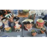 2 Trays of character Jugs and toby jugs together with a Beswick Romeo and Juliet jug - character