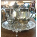 Late 19th/early 20th century silver plated coffee pot, teapot and sucrier on a white metal tray, all