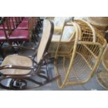 Victorian style bentwood and cane rocking armchair, together with a bamboo egg conservatory seat