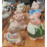Group of five Wade pig money boxes, two without stoppers. (B.P. 21% + VAT)