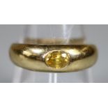 14ct gold ring set with an oval yellow sapphire. Ring size P. Approx weight 5.1g. (B.P. 21% + VAT)