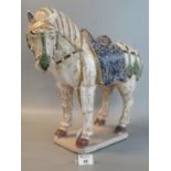Modern pottery study of a Chinese Tang type horse on rectangular base. 40cm high approx. (B.P. 21% +