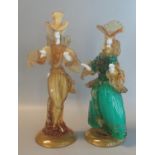 Two similar Murano Art Glass figurines decorated in flamboyant attire.