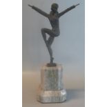 After Chiparus, bronzed metal figure of a dancing girl on tall, grey veined marble base. Overall