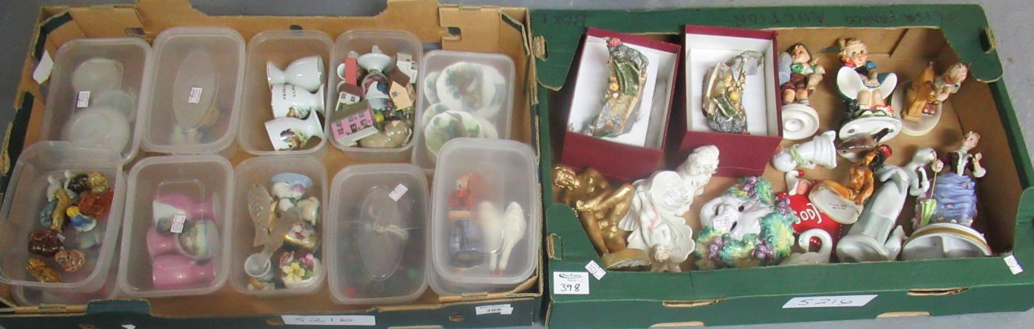 Two boxes of assorted ornaments to include Wade animals, Hummel figurines, miniature Staffordshire