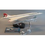 Aluminium desk top model of Concorde on stand, by Nauticalia of London. 42cm long approx. Together