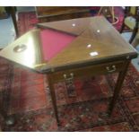 Edwardian mahogany inlaid folding envelope card table on square tapering legs and castors. (B.P. 21%