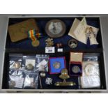 Metal box comprising a collection of military interest including Christmas 1914 tin and card, 1917