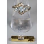 9ct white gold ring set with blue topaz and diamonds together with a 14ct gold pendant set with a