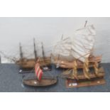 Group of four well detailed ship models to include a Viking long boat, the Cutty Sark, and HMS
