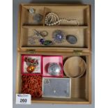 A collection of silver jewellery including coral beads, a silver and enamel brooch, amber etc. (B.P.