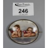 Hand painted porcelain brooch depicting two cherubs. (B.P. 21% + VAT)