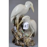 A modern majolica porcelain group of 2 Egrets on a stump unmarked to the base. (B.P. 21% + VAT)