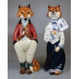 A pair of Cinque Ports Pottery beclothed lady and gentleman ceramic foxes (2) (B.P. 21% + VAT)