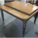 Victorian mahogany extending dining table with moulded edge top and two additional leaves, on