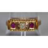 15ct gold diamond and ruby three stone ring. Ring size Q. Approx weight 2.7 grams. (B.P. 21% + VAT)