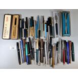Large collection of assorted writing instruments to include: Parker and other pens, biros etc. (B.P.