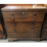Early 19th century Welsh oak secretaire chest of four drawers, with reeded edge top on pierced