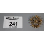 A Victorian 15ct gold pearl set floral brooch. Approx weight 4.1 grams. (B.P. 21% + VAT)