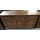 Reproduction 18th century style Welsh oak dresser base with three cock beaded drawers over three