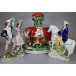 Three 19th century Staffordshire Flatback Figurines: highwayman on horseback entitled 'Tom King',