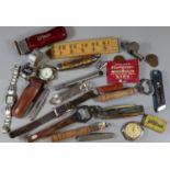 Box of assorted items including: pen-knives, gents watches, bottle openers, folding ruler, Acme