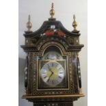 Modern chinoiserie decorated long case clock with pagoda hood above arched aperture with brass