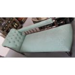 Edwardian stained frame buttoned scroll arm chaise lounge on ceramic castors. (B.P. 21% + VAT)
