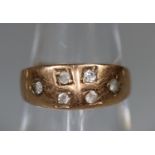 A 9ct rose gold ring set with white stones. Ring size K. Approx weight 2 grams. (B.P. 21% + VAT)