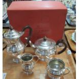 Garrard and Co. silver plated tea set, coffee pot and teapot have wooden handles and knops