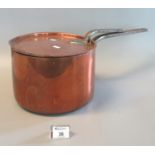 Large copper saucepan with iron handle and cover with similar iron handle. 27cm diameter approx. (