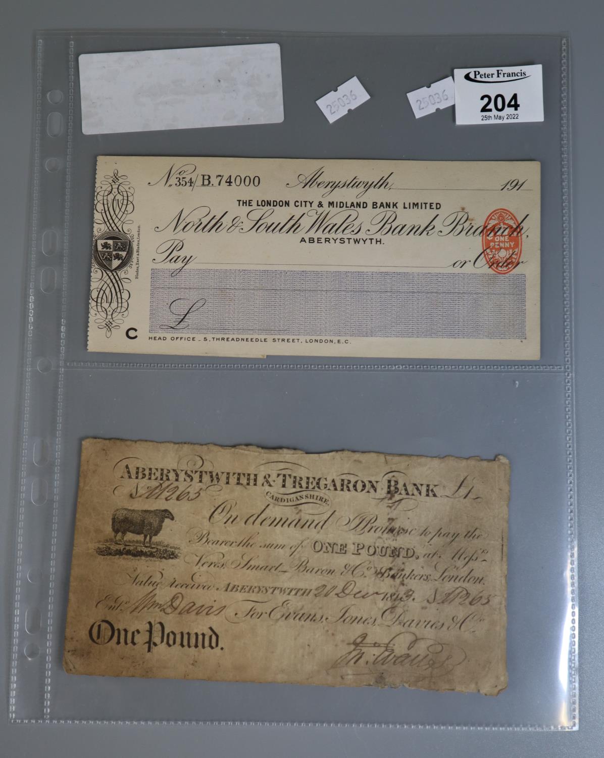 Aberystwith and Tregaron Bank £1 note dated 1813, together with a blank cheque drawn on The London