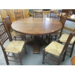 Good heavy quality oak circular pedestal dining table with baluster support and quatrefoil base.