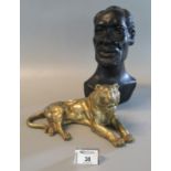 Japanese yellow metal study of a recumbent tiger, with character marks to base. 28cm wide approx.