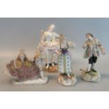 A group of assorted German porcelain figures to include; Meissen figure of a woman asleep in her