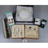 A collection of silver and costume jewellery and an autograph book. (B.P. 21% + VAT).