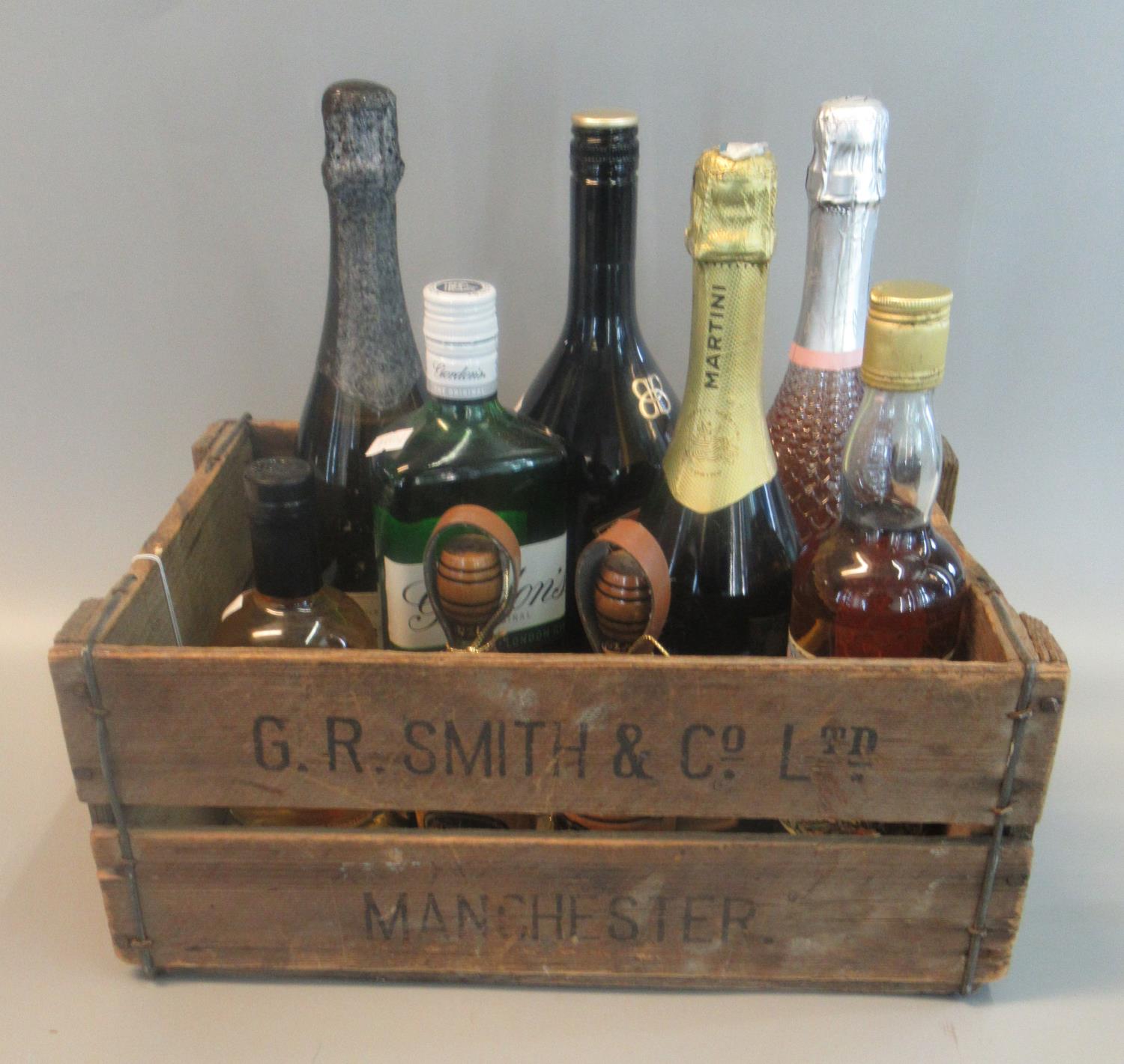 Wooden G.R Smith & Co. Ltd. crate containing bottles of alcohol to include: Gordons Gin, M&S