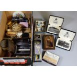 Box of oddments including cigarette lighters, writing instruments, etc. (B.P. 21% + VAT)