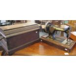 Singer hand sewing machine in oak case. (B.P. 21% + VAT)