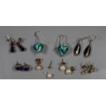 A collection of earring for pierced ears including cultured pearls. (B.P. 21% + VAT)