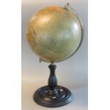 Modern terrestrial globe on moulded wooden stand. Overall 58cm high approx. (B.P. 21% + VAT)