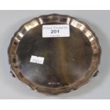 Emile Viner's Sheffield, a small silver pie crust salver, on three scroll feet. 6.1 Troy Oz